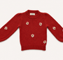 Saco tejido infantil en algodón color terracota con diseño clásico y artesanal.