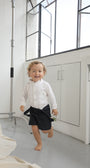 Short Agus Azul Navy para niño usado sin cargaderas con diseño clásico y elegante  y guayabera mati.