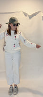 Detalle de los bailarines bordados a mano del Saco Tiny Dancers para mujer.
