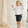 Short Agus Azul Navy para niño en lino con cargaderas ajustables de La Tutu.